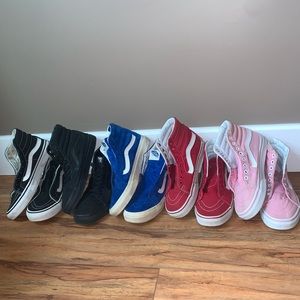 5 pairs of high top Vans